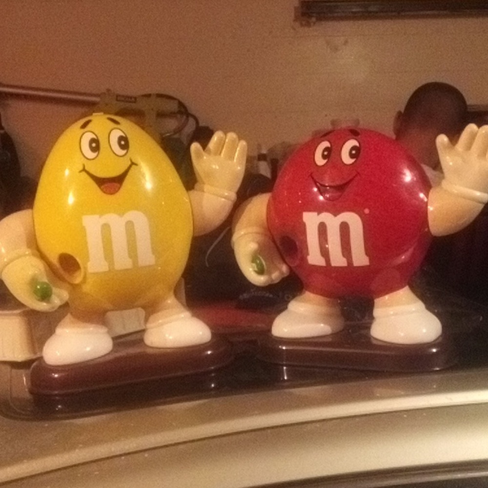Two M&M's Vintage - 1991 Mars, Inc. Red and yellow M&M's Waving Candy Dispenser